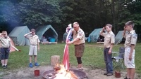 My favorite picture of Dave from scouts.  I took this picture while we were at summer camp.  He was teaching the boys the proper way to retire a flag.  His influence on the young men of Pack 894 and Troop 894 will last a lifetime.